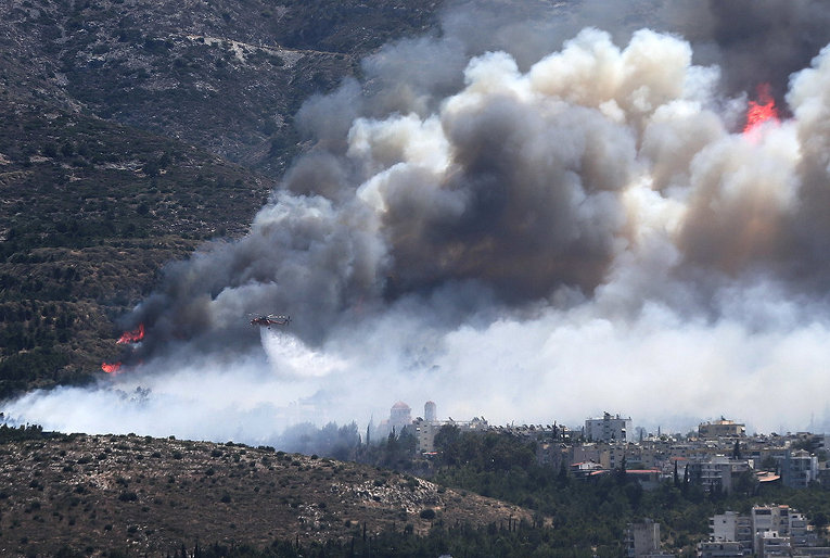 Причиной пожаров в Греции, встревоживших туристов, местные правоохранители считают поджоги